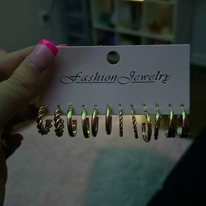 Assorted gold earrings